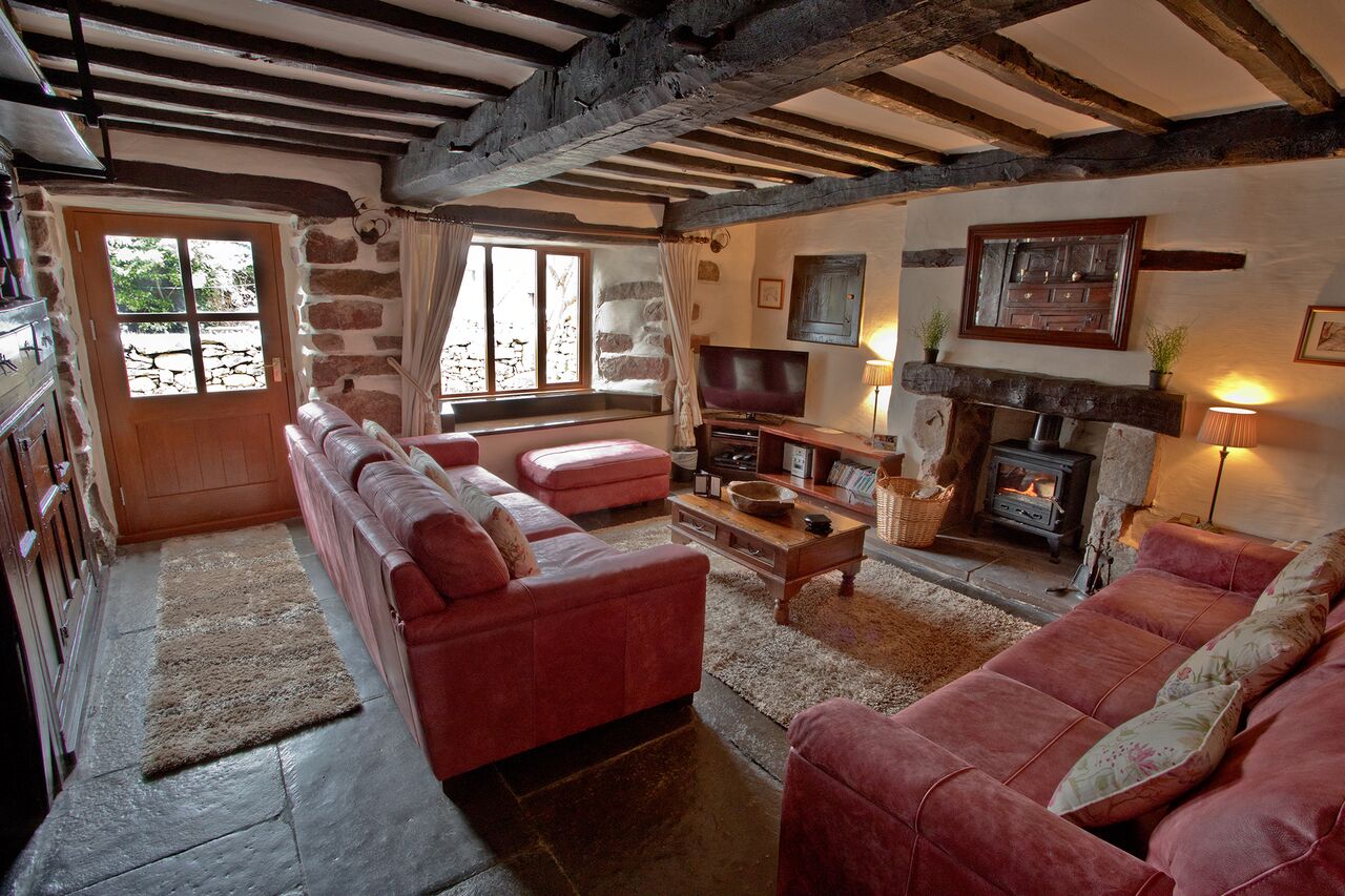 Farmhouse Oak Beamed Living Room with cosy woodburner